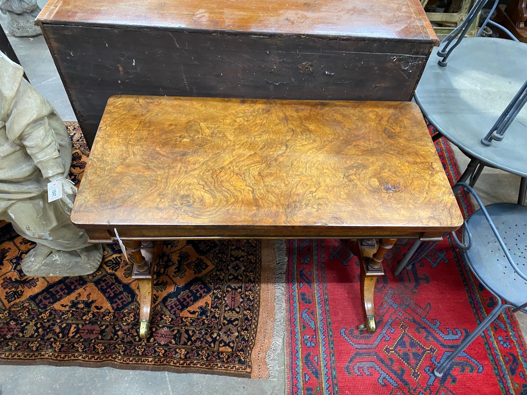 A Victorian figured walnut rectangular folding card table, width 92cm, depth 45cm, height 72cm